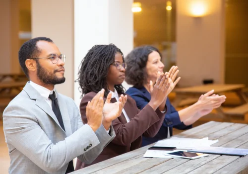 excited-inspired-business-people-applauding-speaker